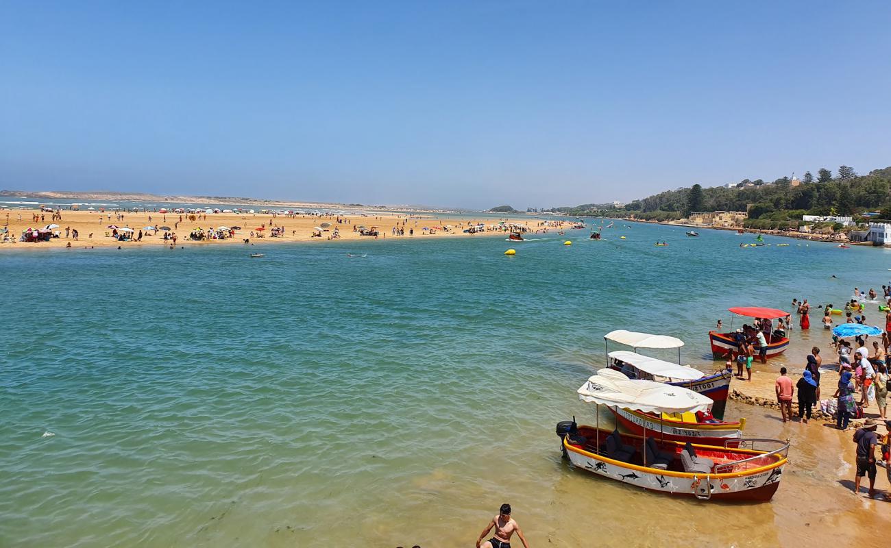 Foto de Plage Oualidia con brillante arena fina superficie