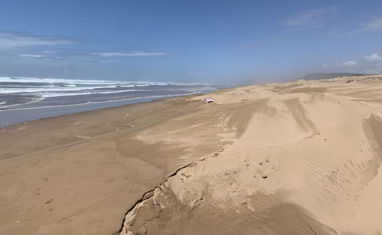 Foto de Plage con brillante arena fina superficie