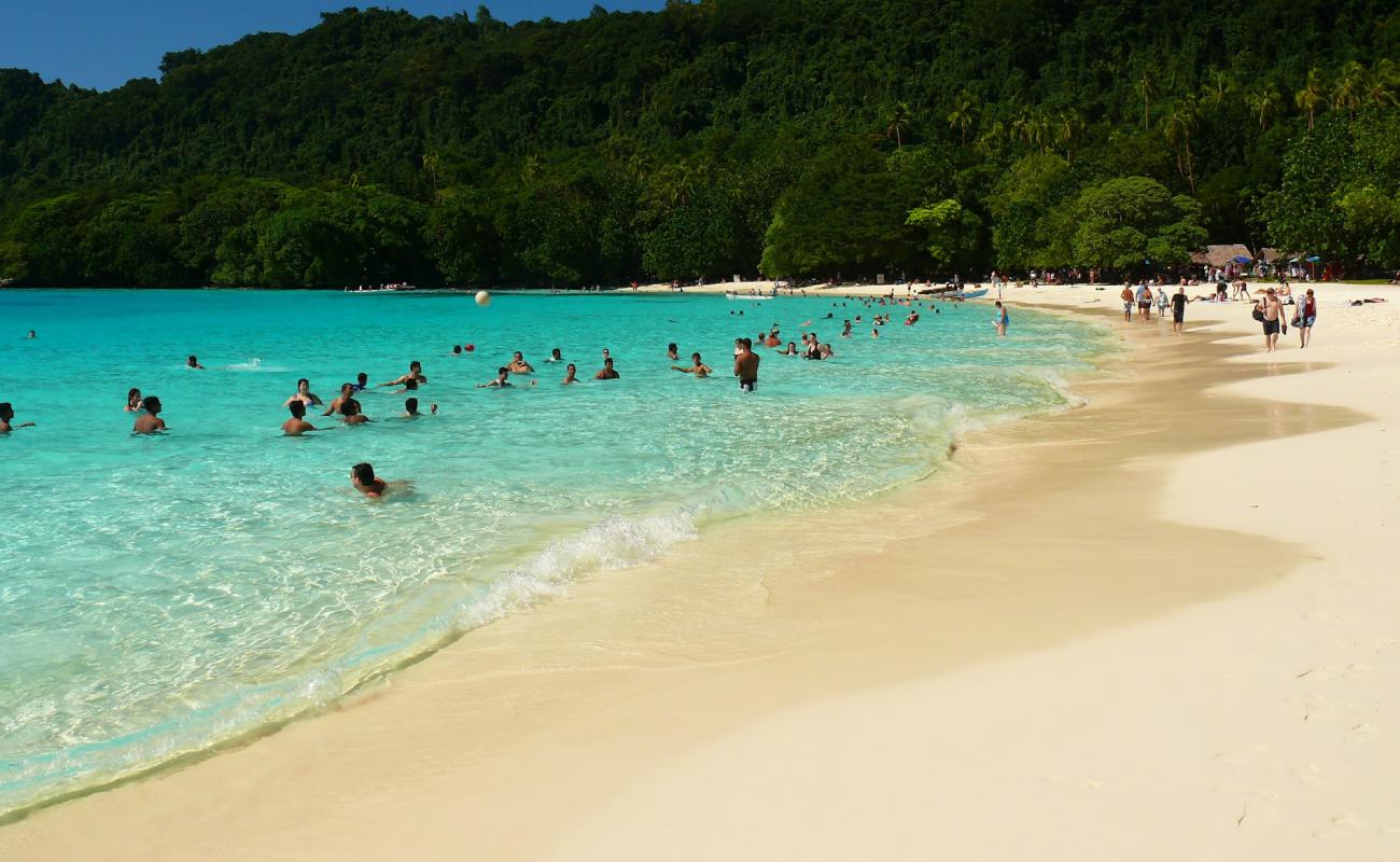 Foto de Playa Champagne con arena fina blanca superficie