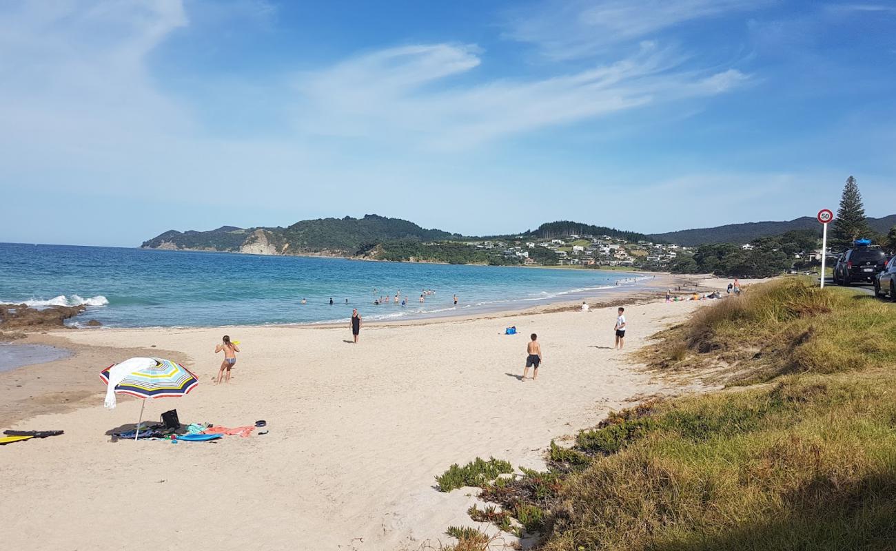 Foto de Langs Beach con arena brillante superficie