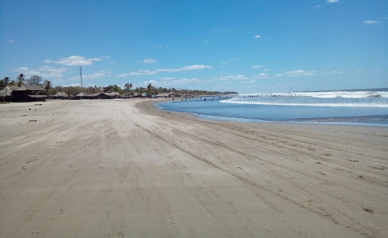 Foto de Playa de Pochomil con arena brillante superficie