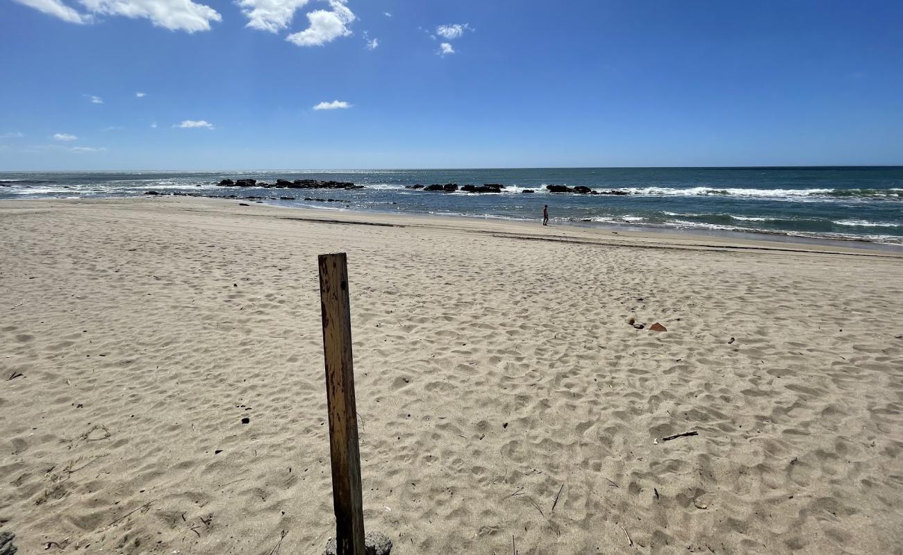 Foto de Playa el Tamarindo con arena brillante superficie