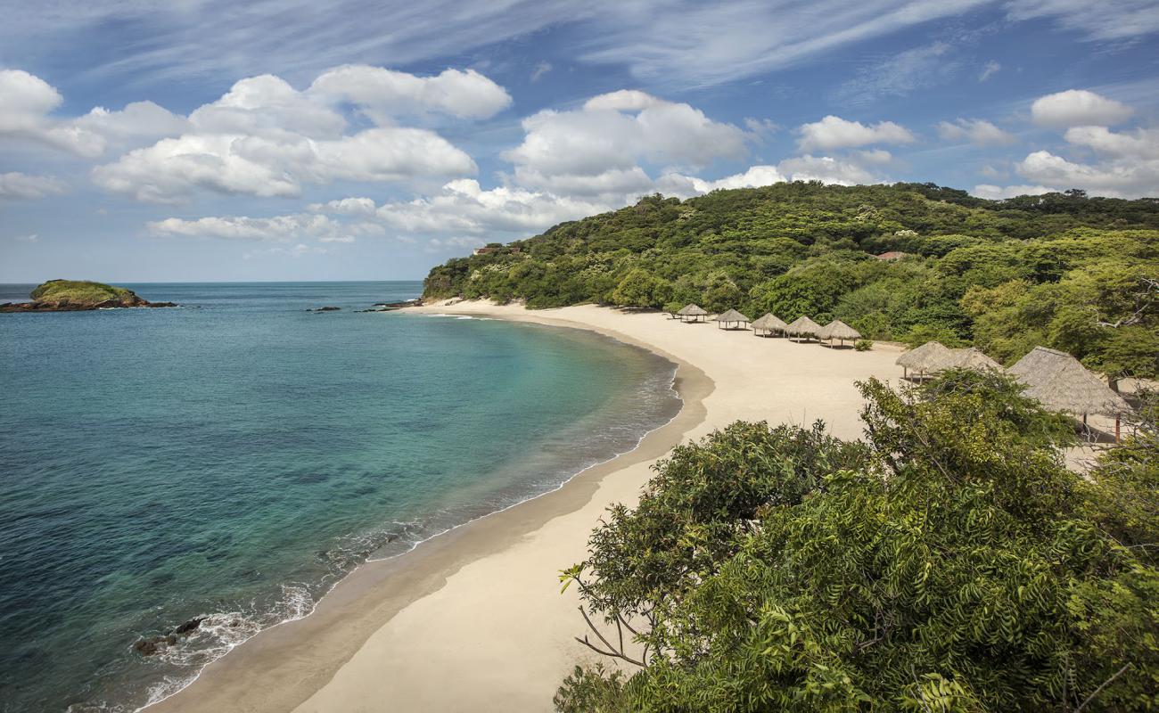 Foto de Playa Manzanillo con arena brillante superficie