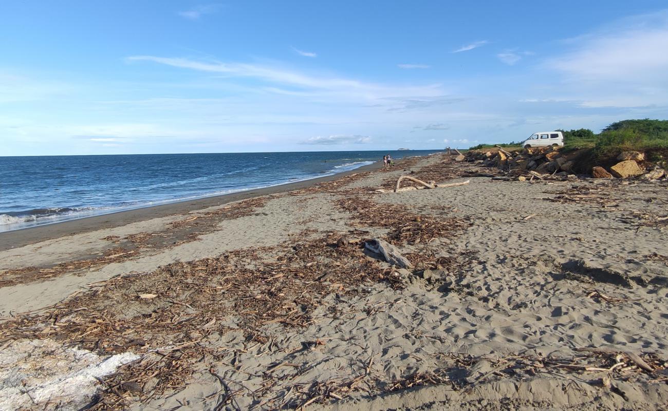 Foto de Monagre Beach con arena oscura superficie