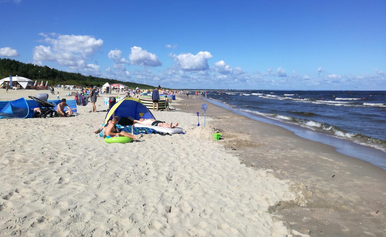 Foto de Jantar beach con arena blanca superficie