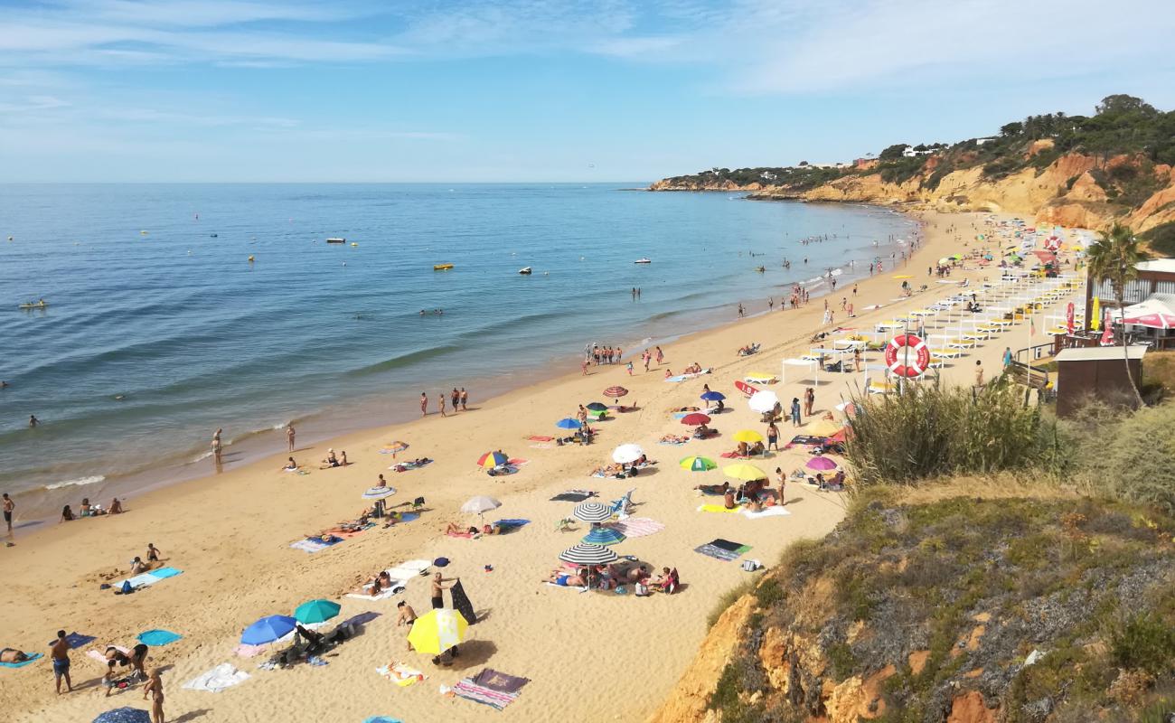 Foto de Praia Maria Luisa con arena fina oscura superficie