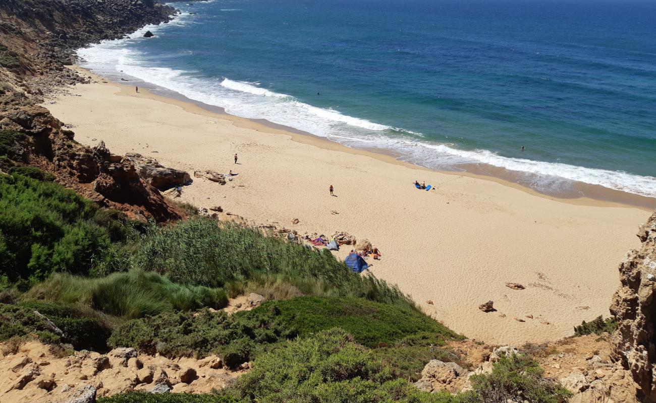 Foto de Praia do Telheiro con arena oscura superficie