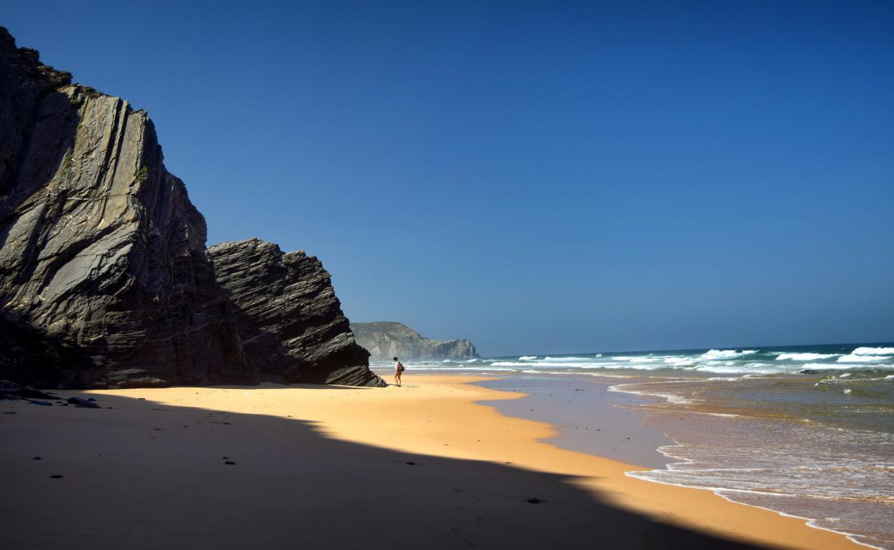 Foto de Barriga Beach con arena brillante superficie