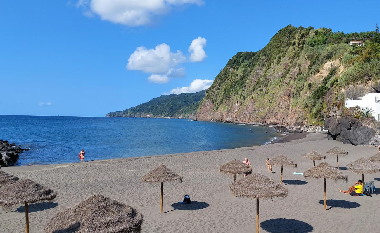 Foto de Povoacao Beach con arena/piedras blanca superficie