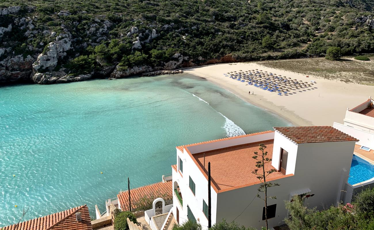 Foto de Cala en Porter con brillante arena fina superficie