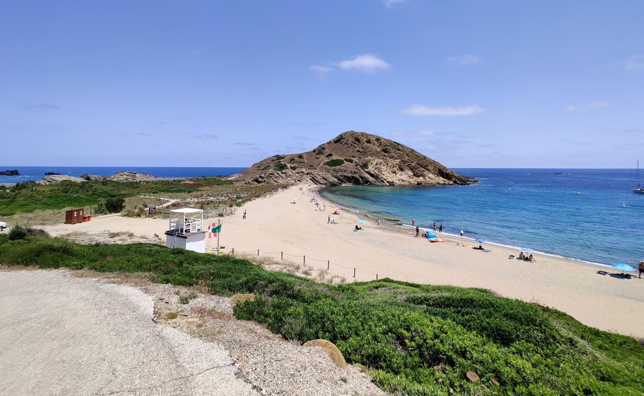 Foto de Cala Mesquida con brillante arena fina superficie