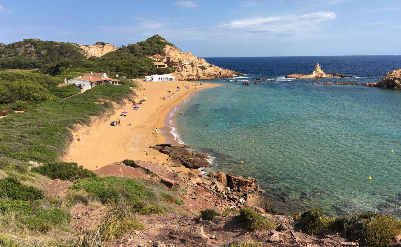 Foto de Cala Pregonda con arena oscura superficie