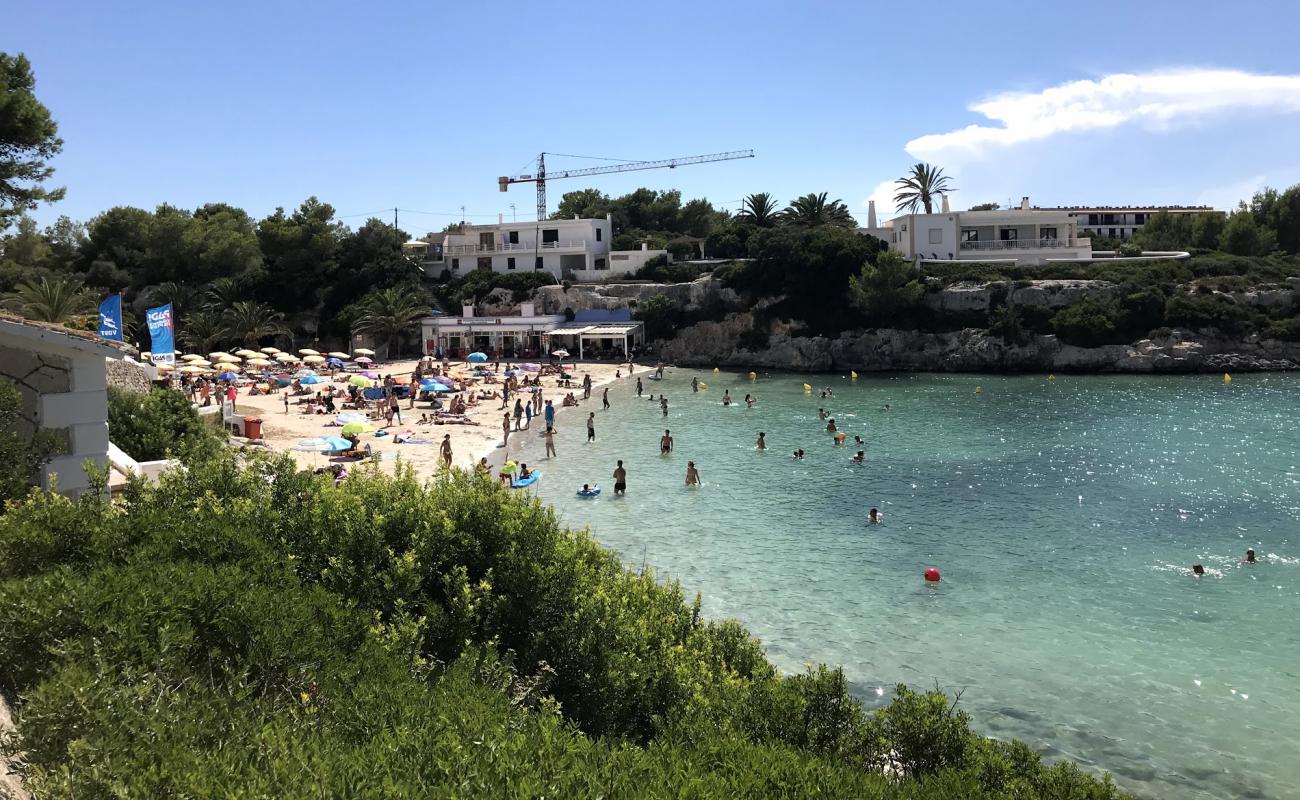 Foto de Cala Santandria con brillante arena fina superficie