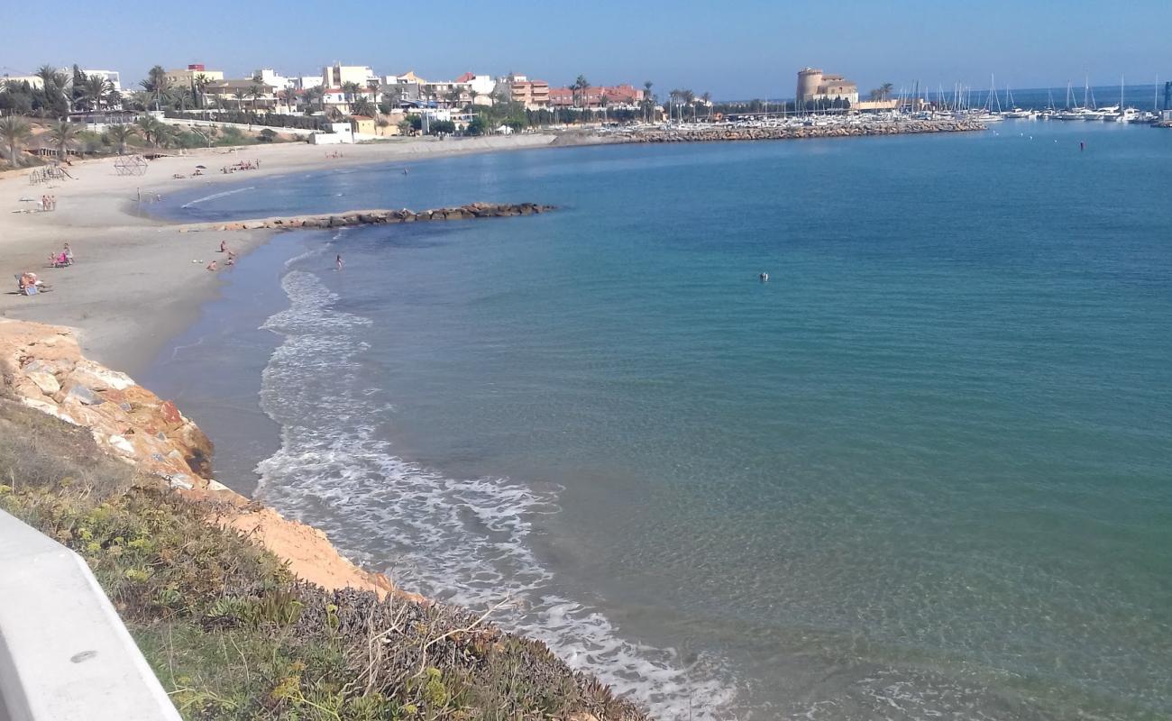 Foto de Playa del Puerto con arena brillante superficie