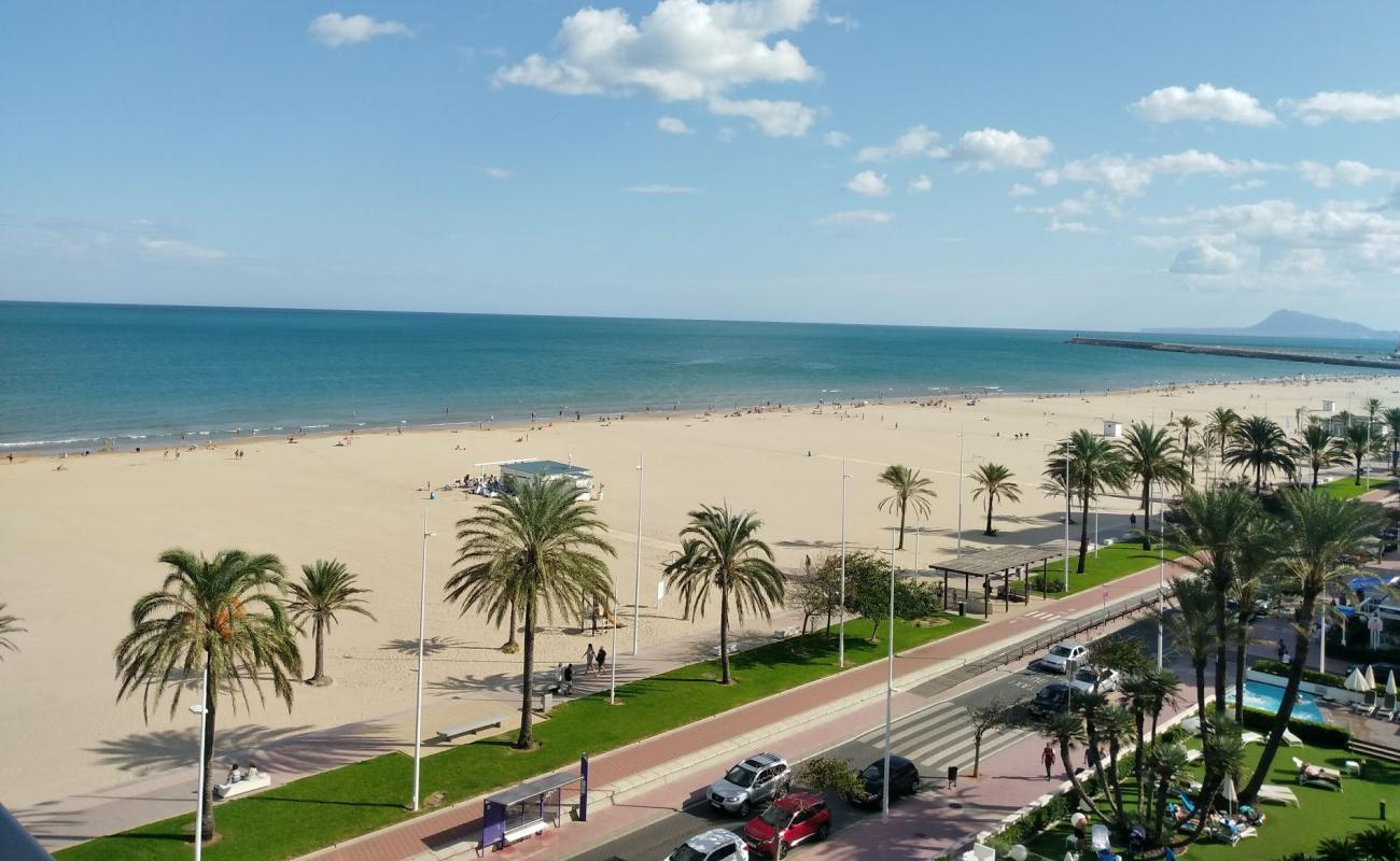 Foto de Gandia Playa con arena brillante superficie