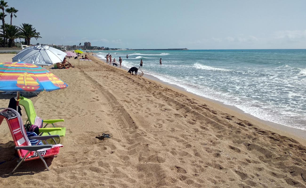 Foto de Platja del Morrongo con arena oscura superficie