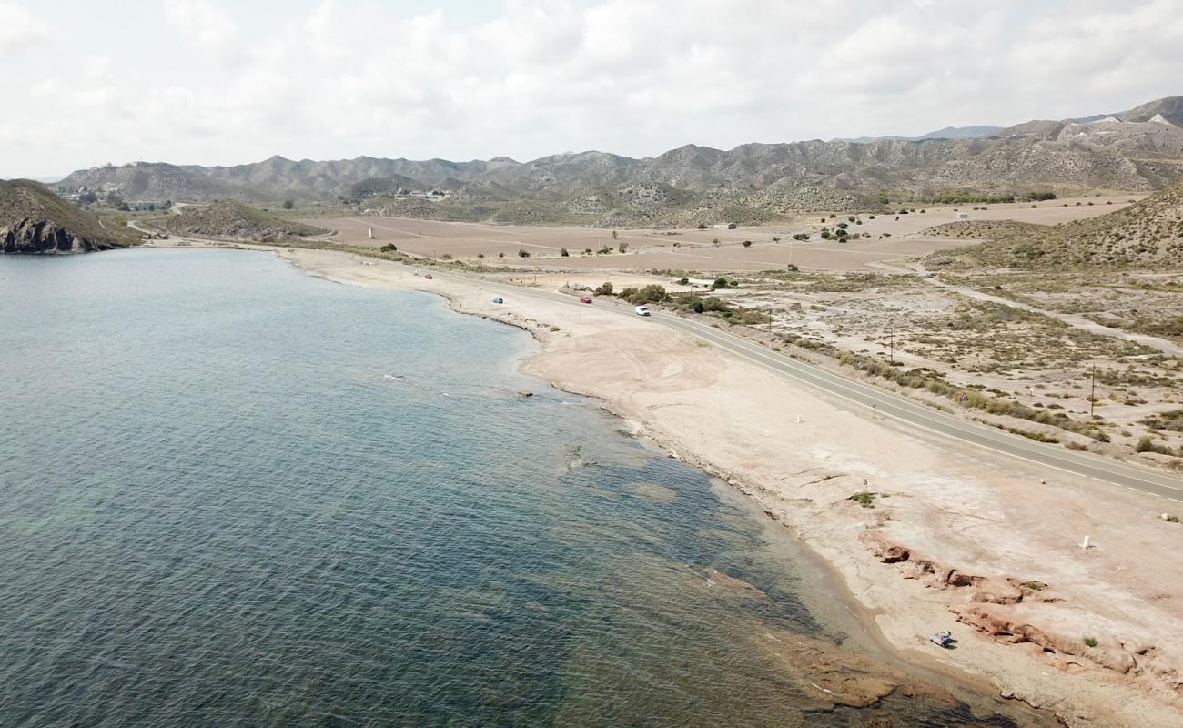 Foto de Playa de la Cola con arena gris superficie