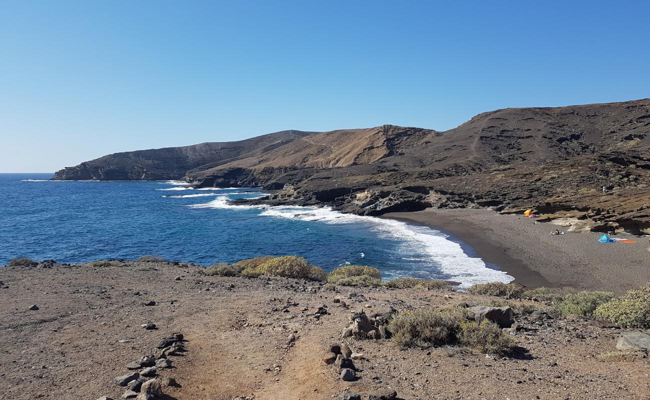 Foto de Playa Escondida con arena oscura superficie