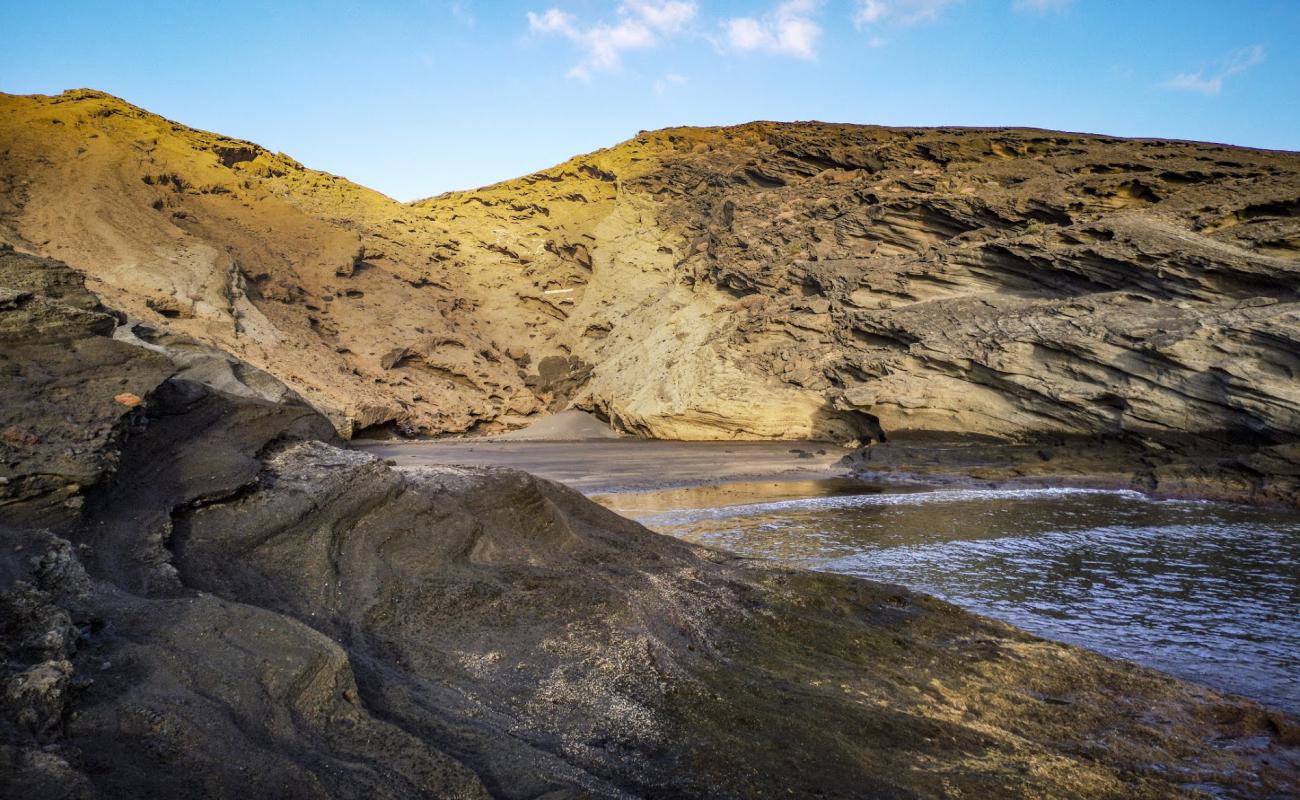 Foto de Playa Escondida II con arena oscura superficie