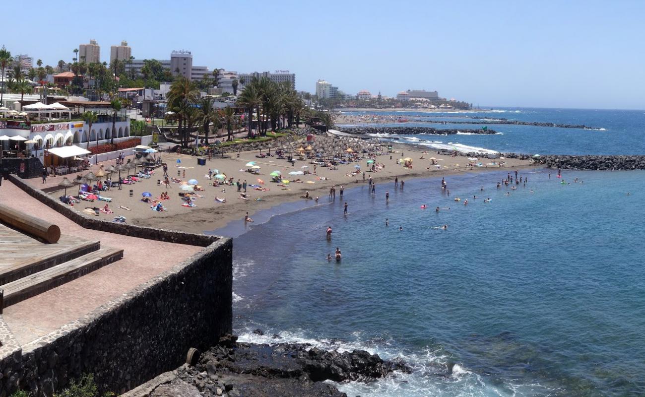 Foto de Playa de Troya con arena oscura superficie