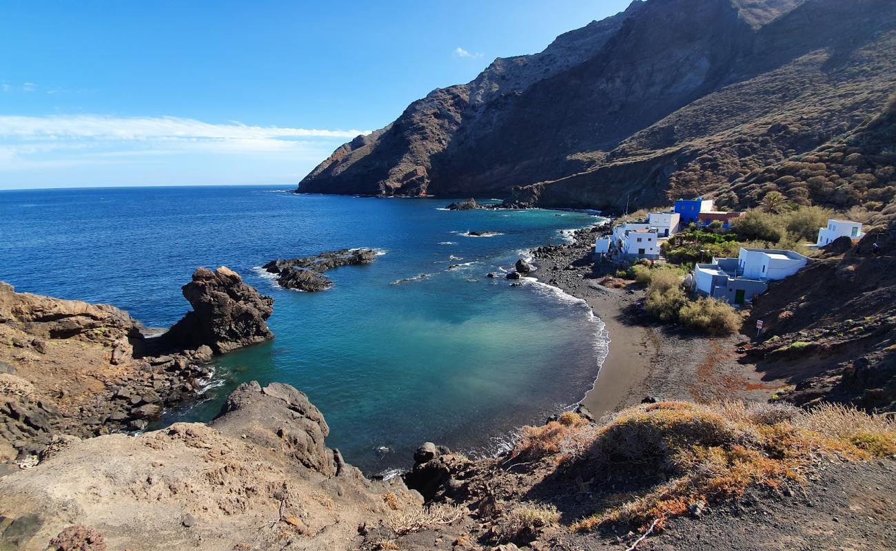 Foto de Playa Casas Blancas con arena gris superficie