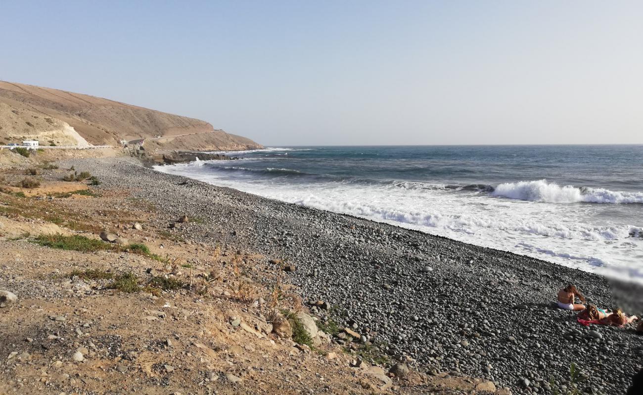 Foto de Playa de las Carpinteras con arena gris y guijarros superficie