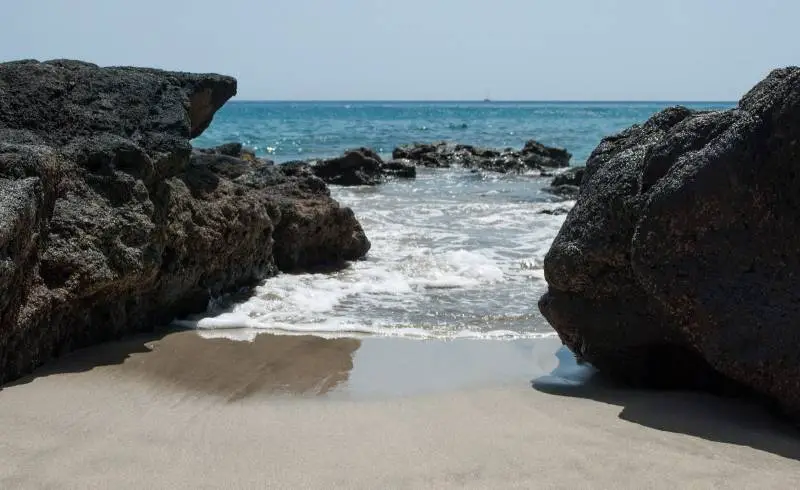 Foto de Playa Juan Gomez II con arena brillante superficie