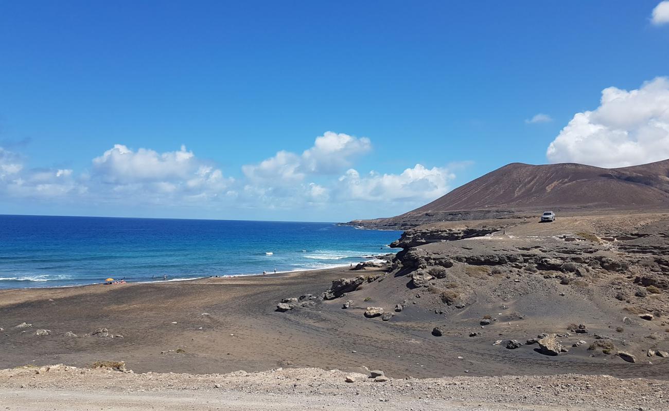 Foto de Playa de la Solapa con arena oscura superficie