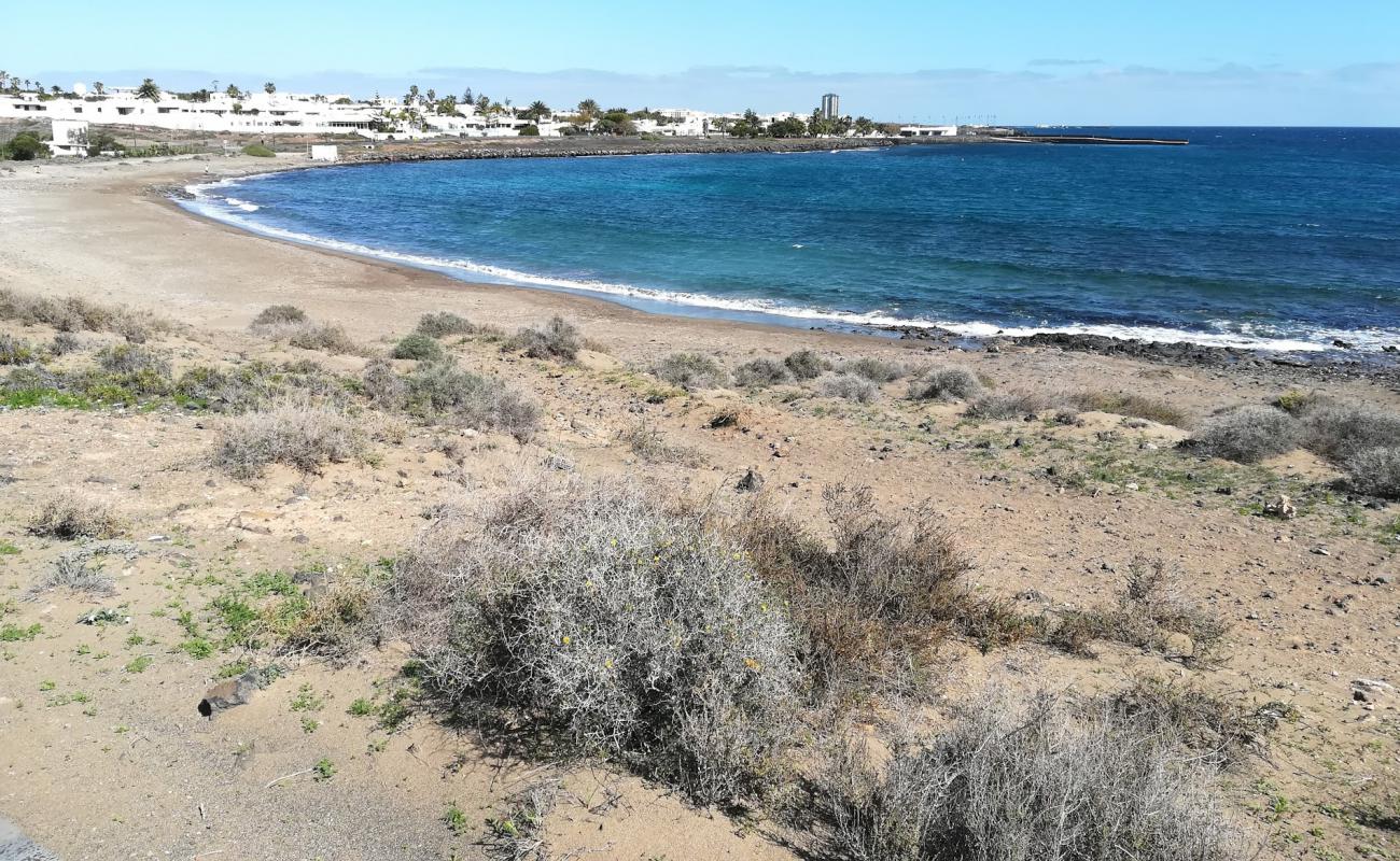 Foto de Playa del cable con arena/guijarros negro superficie