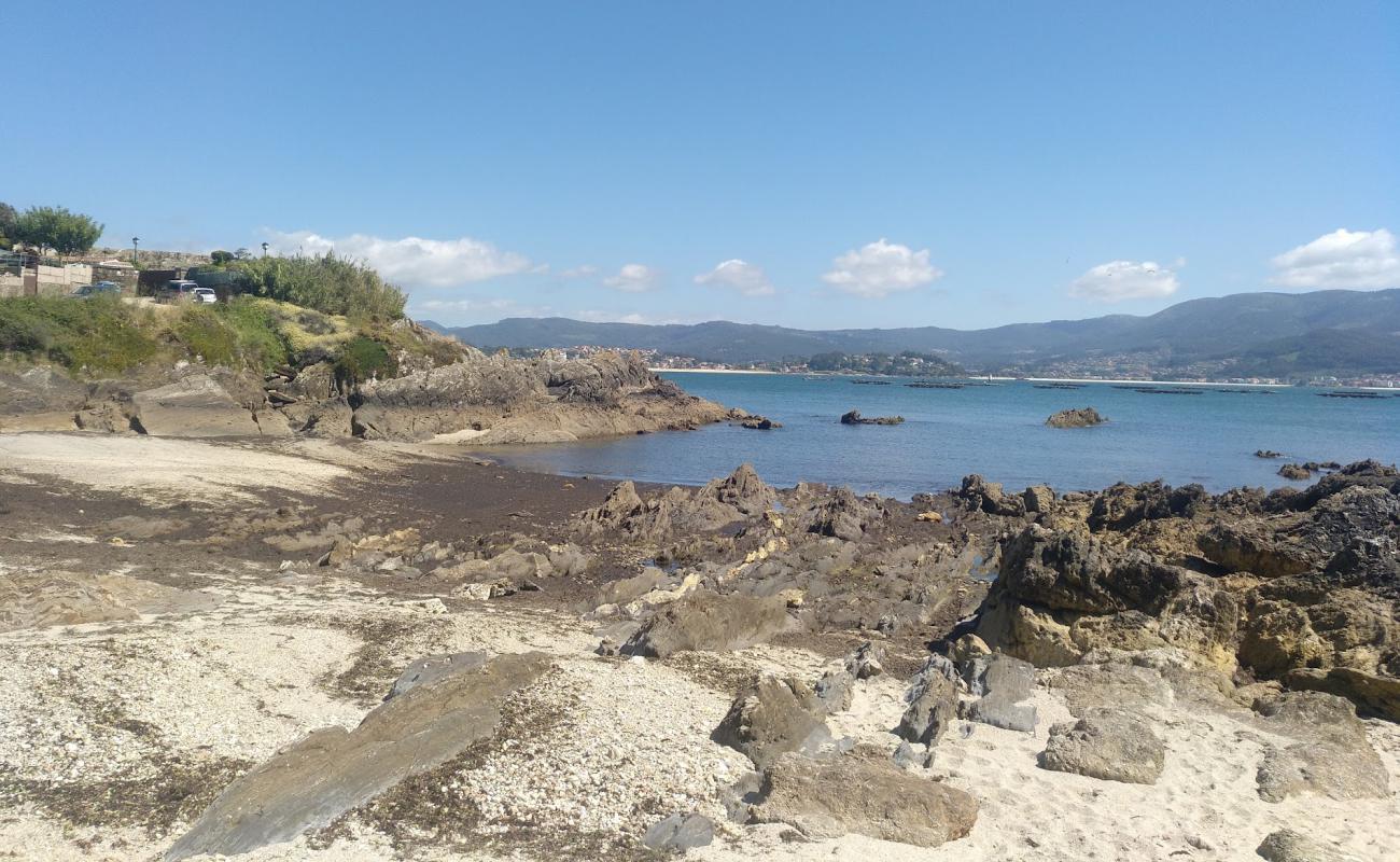 Foto de Praia de Portocelo con arena blanca superficie