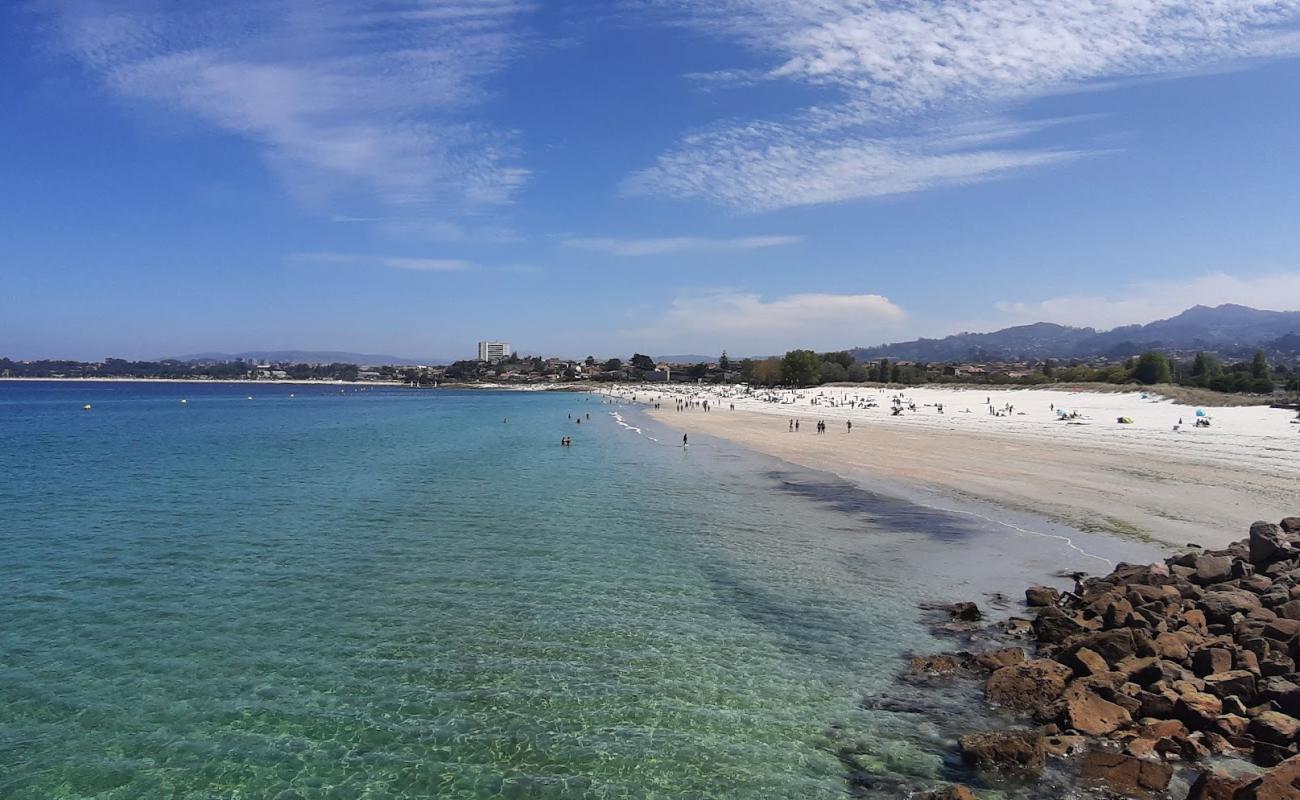 Foto de Playa del Vao con arena fina blanca superficie