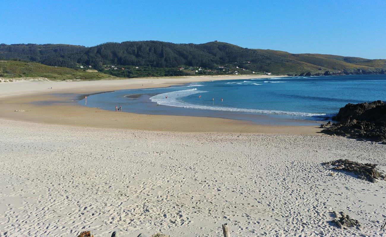 Foto de Praia de Doninos con arena fina blanca superficie