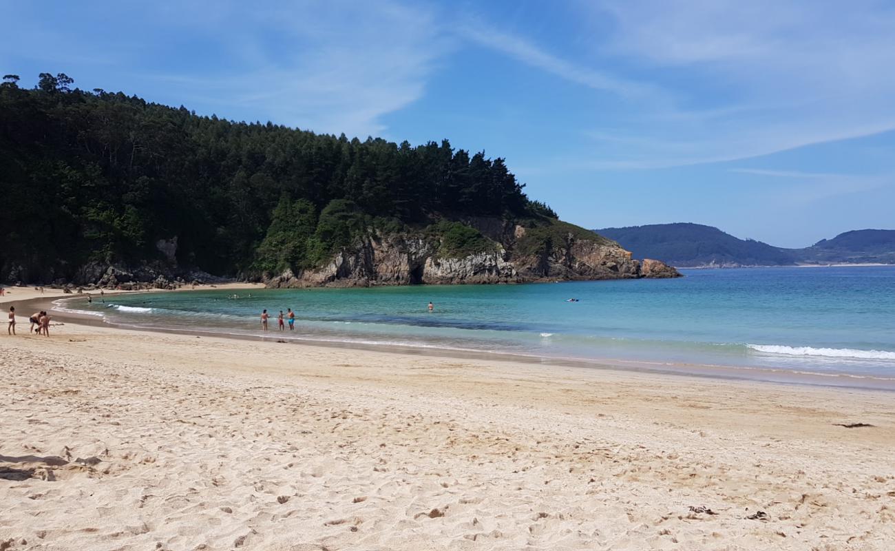 Foto de Playa Xilloi con arena fina blanca superficie