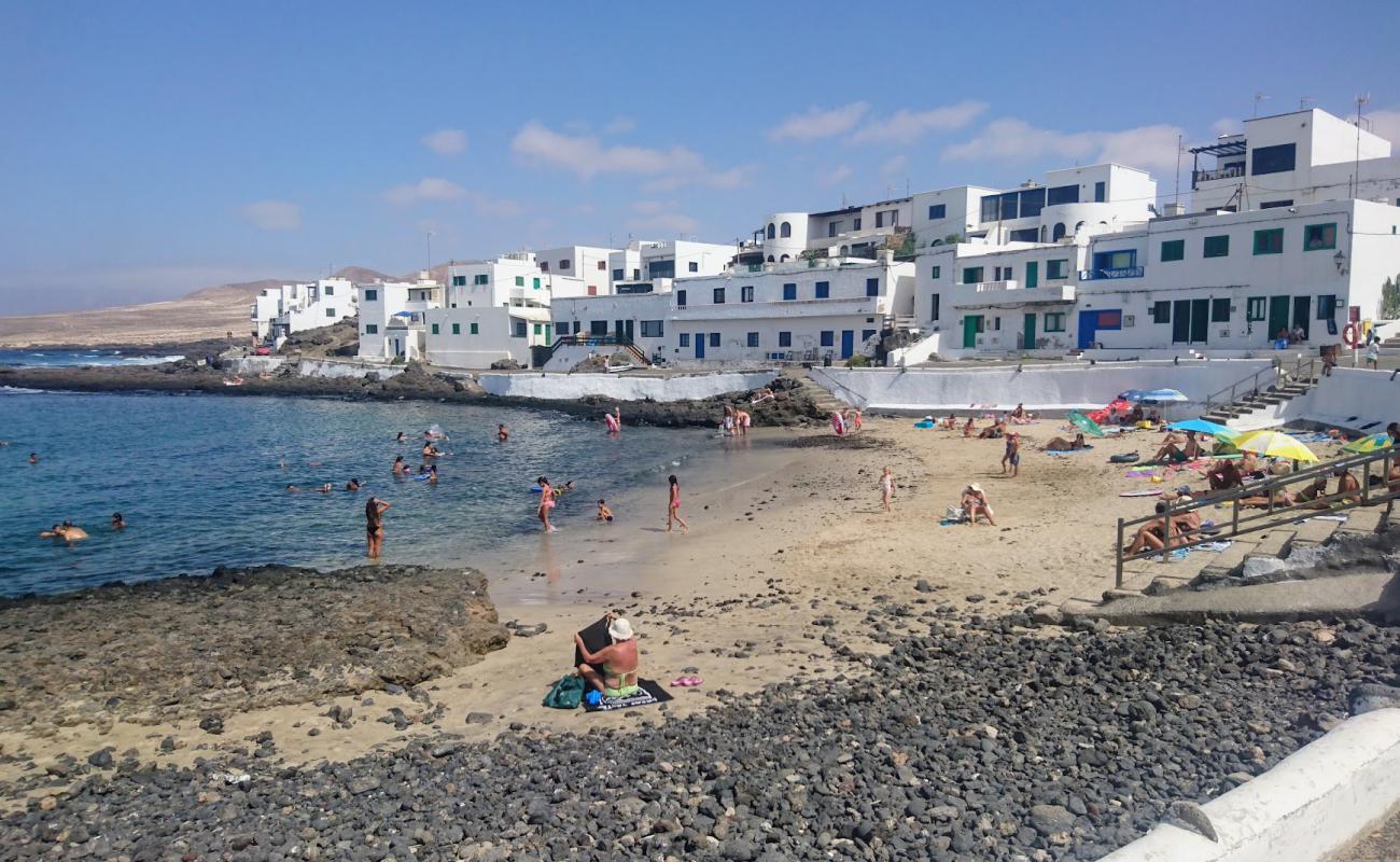 Foto de La Caleta de Caballo Beach con arena brillante superficie