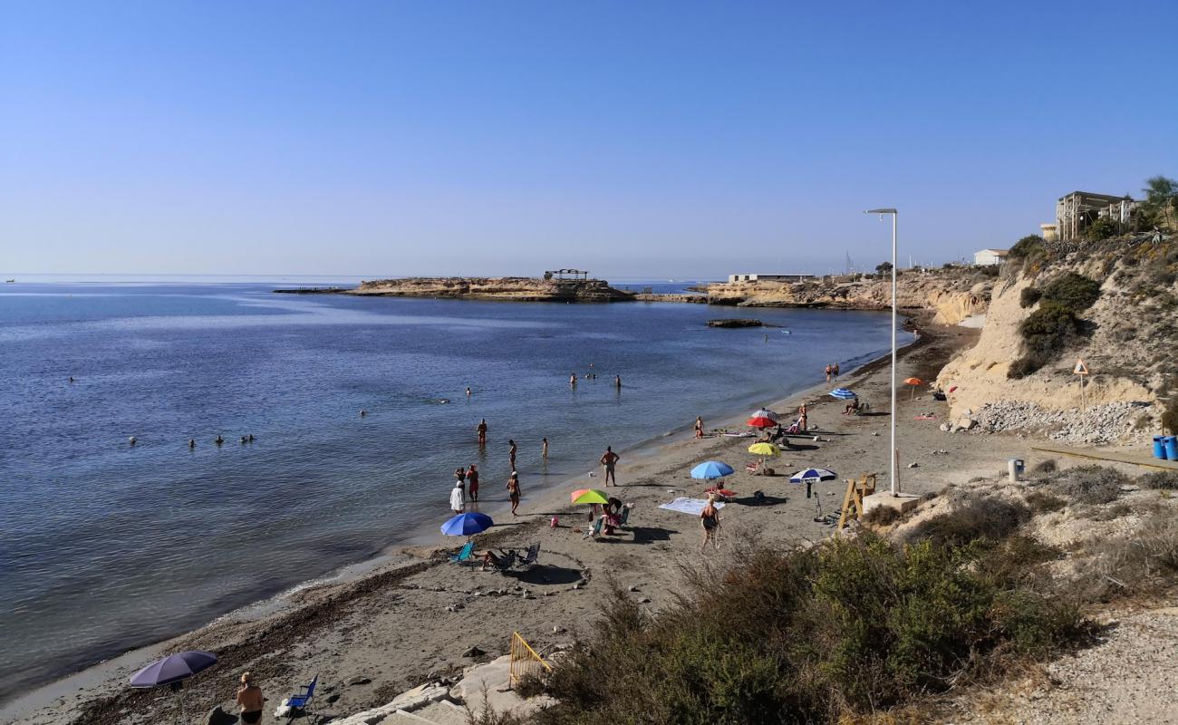 Foto de l'Almadrava Beach con arena brillante superficie