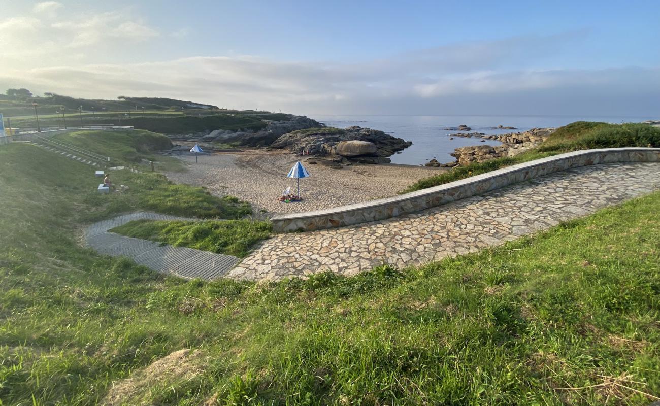 Foto de Relino Beach con arena brillante superficie