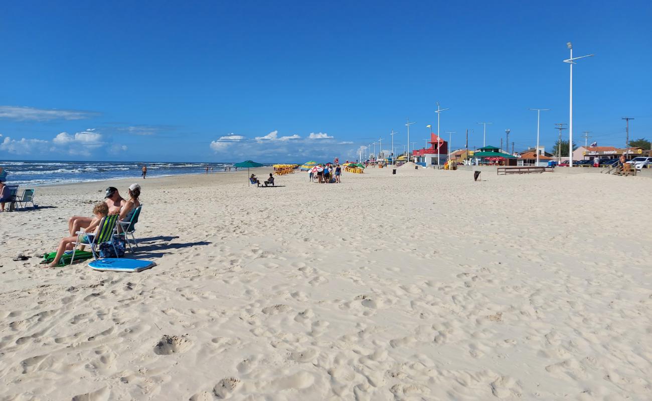 Foto de Praia de Imbe con brillante arena fina superficie