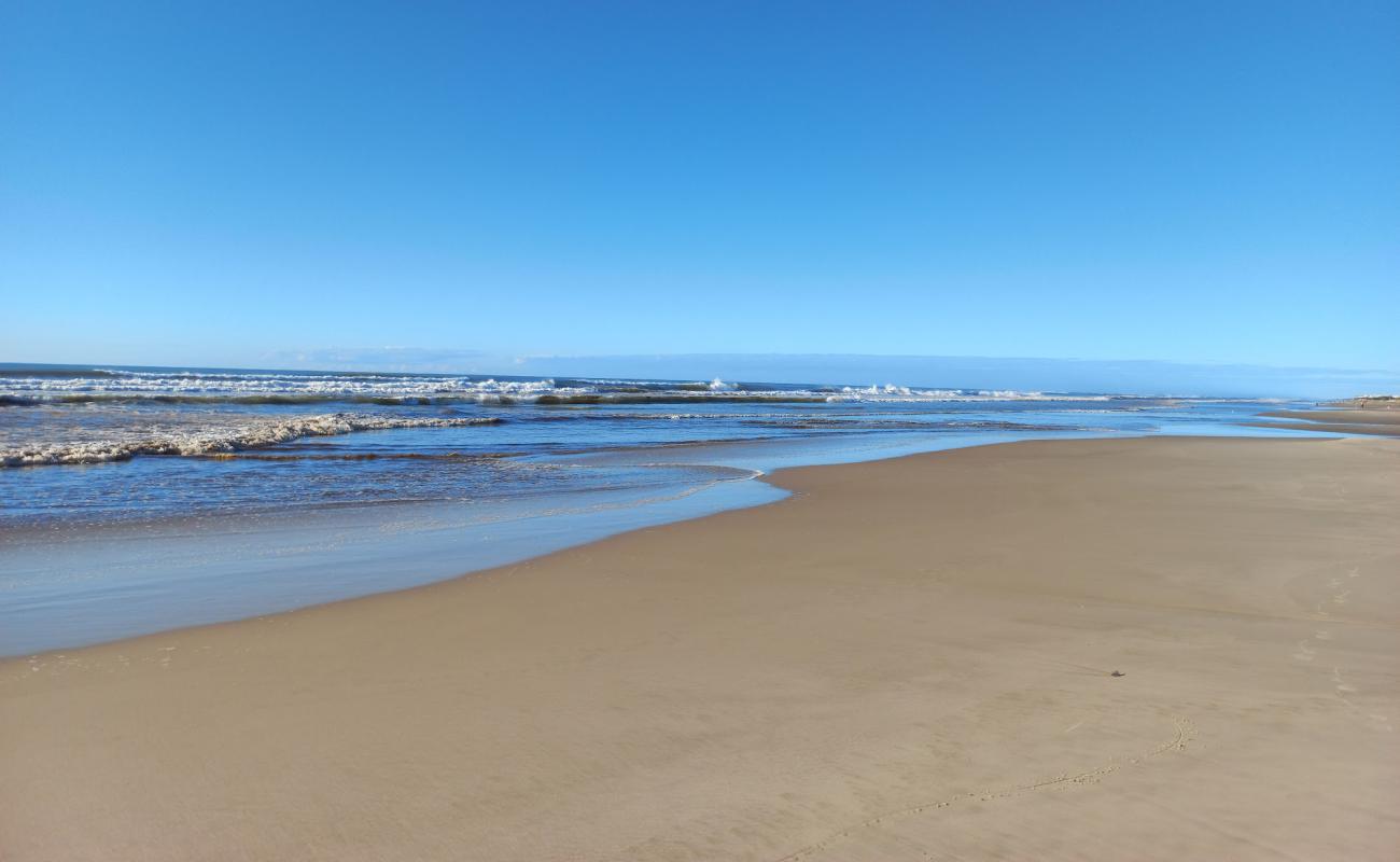 Foto de Playa Capao Novo con arena brillante superficie