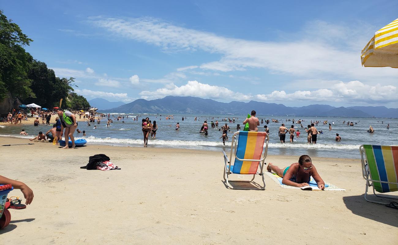 Foto de Playa de Caragua con brillante arena fina superficie