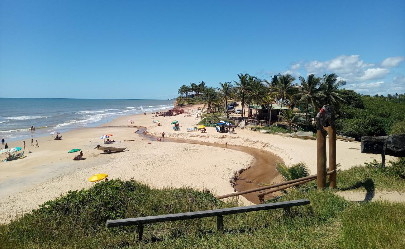 Foto de Playa Dourada con arena brillante superficie