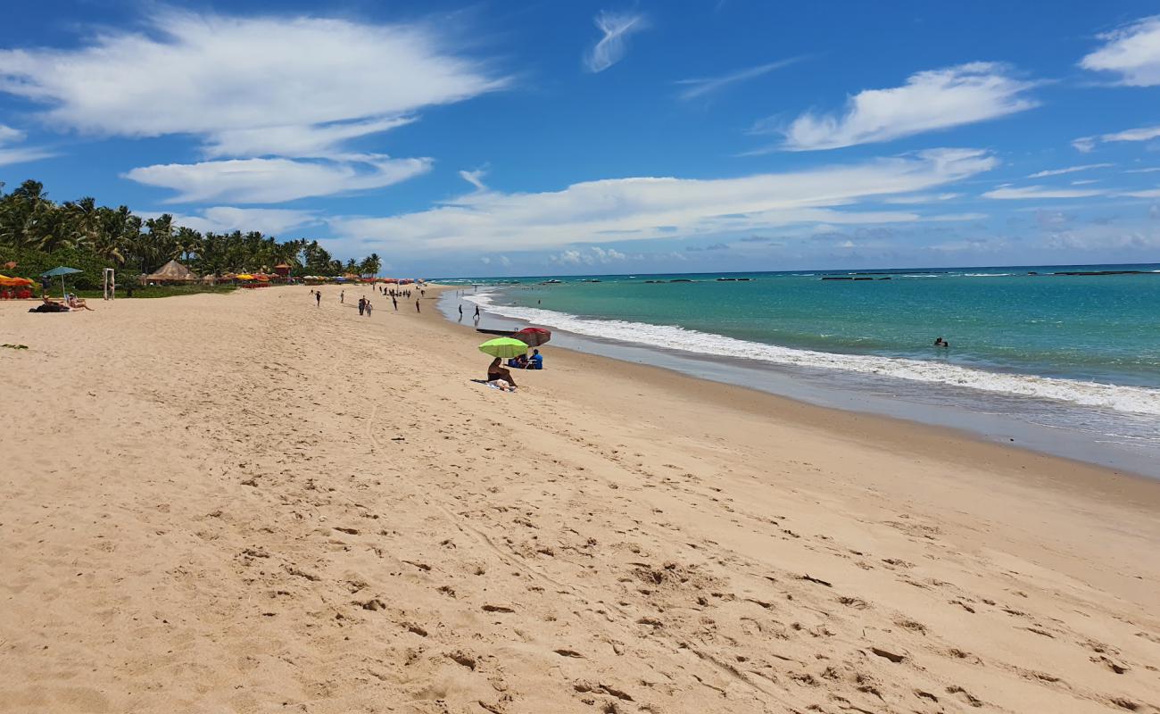 Foto de Praia de Guaxuma con arena brillante superficie