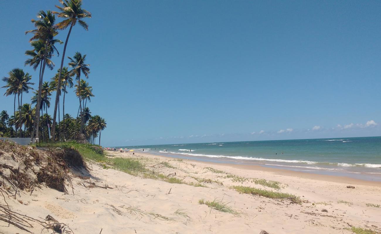 Foto de Praia das Caletas con arena brillante superficie