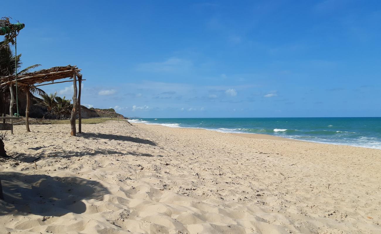 Foto de Playa Tambá con arena brillante superficie