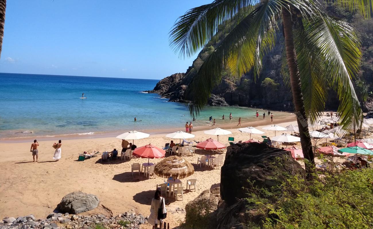 Foto de Praia do Cachorro con arena brillante superficie