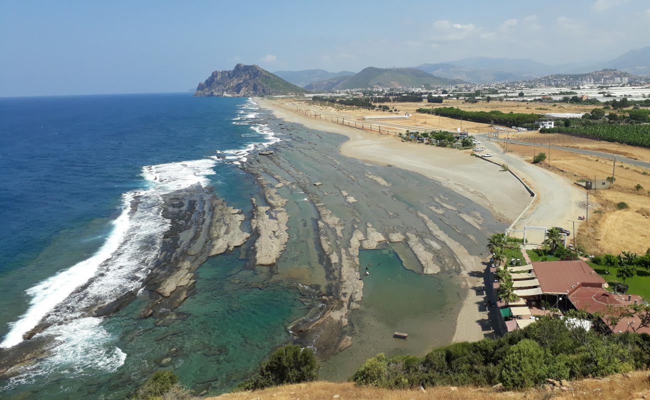 Foto de Bidi Bidi beach con arena/piedras marrón superficie