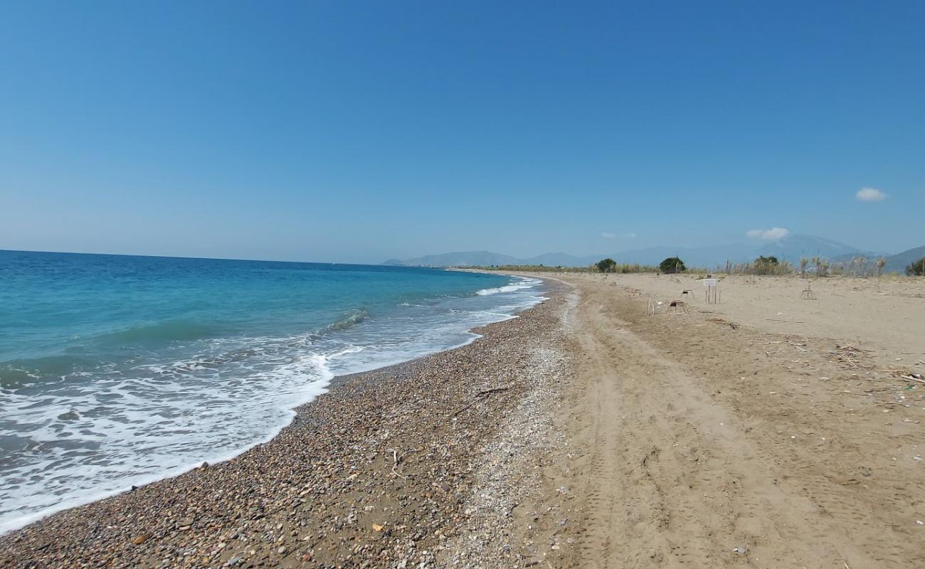 Foto de Kocadut beach con arena oscura superficie