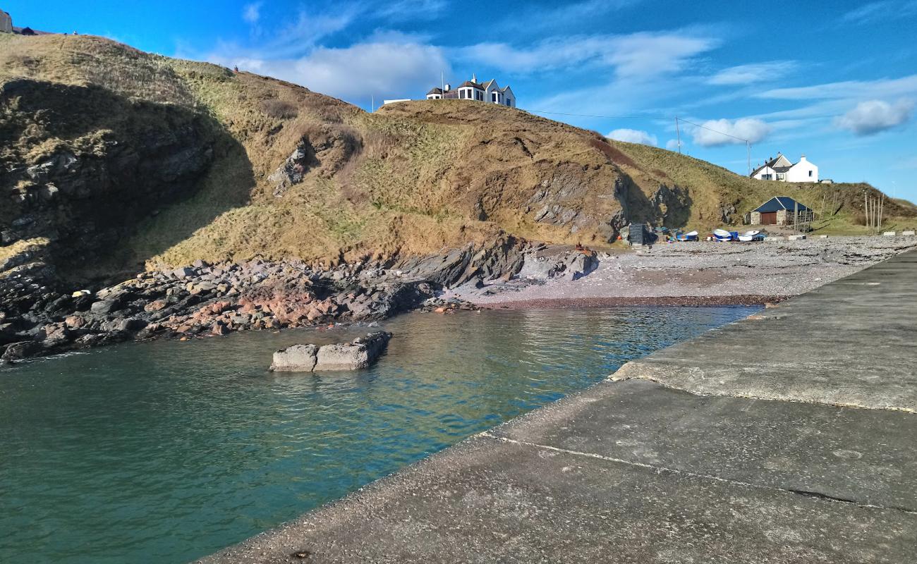 Foto de Cove Bay Harbour Beach con piedra superficie