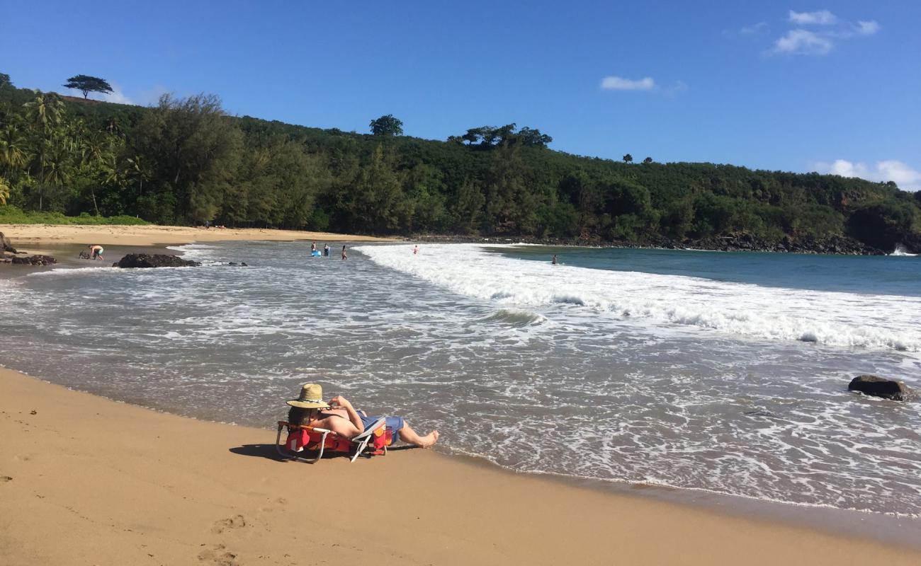 Foto de Ka Lae O Kaiwa Beach con arena brillante superficie