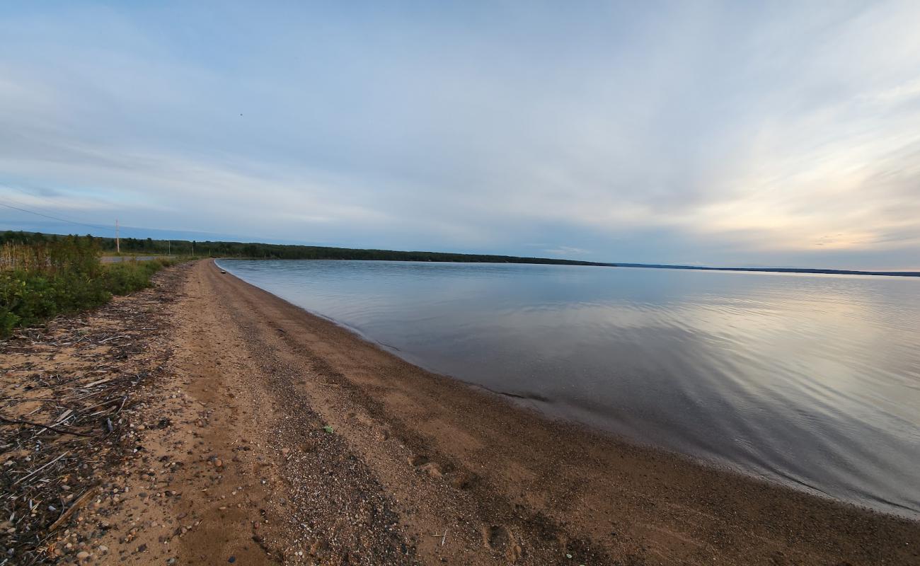 Foto de First Sand Beach con arena fina y guijarros superficie