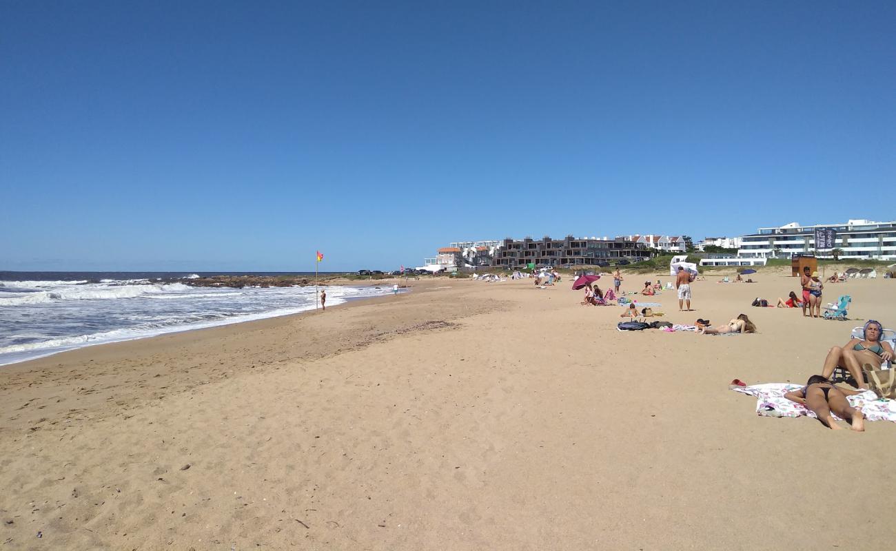 Foto de Playa Montoya con arena brillante superficie